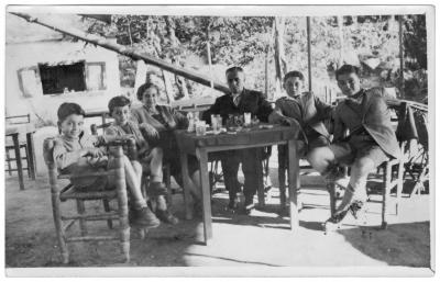 Photo caption: Author Claudette Suttons grandparents and their children, on the patio outside their home in Aleppo, around 1946.