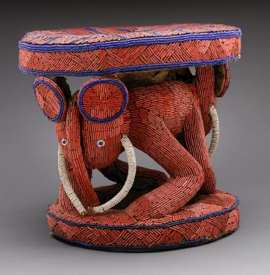 Fons royal stool, 19th century Bamileke peoples  Grasslands, Cameroon Wood, glass beads, raffia cloth 16 1/8 x 17  x 19 6/8 in. (41 x 45 x 50 cm.) The Field Museum, 175558 Photograph by John Weinstein