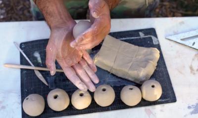 Hand Making A Clay Bead 