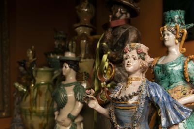2-MOIFA_Espinar_03: “The Ladies,” grouping of ceramic figurative candlesticks and pitchers from Sicily, Peru and France.