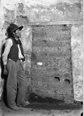 19-NMHM-Title: Unidentified man during restoration of the Palace of the Governors,  1912 