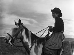 Navajo Woman on Horseback