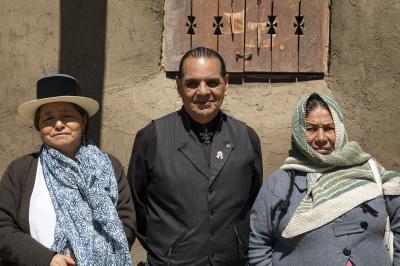 2-MOIFA-Gallery of Conscience :  Peruvian visitors Adelina Garcia, Wari Zarate, Rosalia Tineo Pause for a moment during a group visit to the Abiquiu Morada, April 9th, 2018    Photographer: Chloe Accardi 